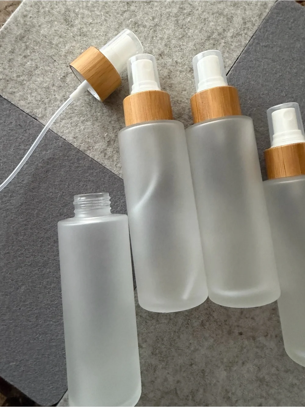 Frosted 100ml Glass Spray Bottle with Bamboo Pump - Clear/Beige set of 4